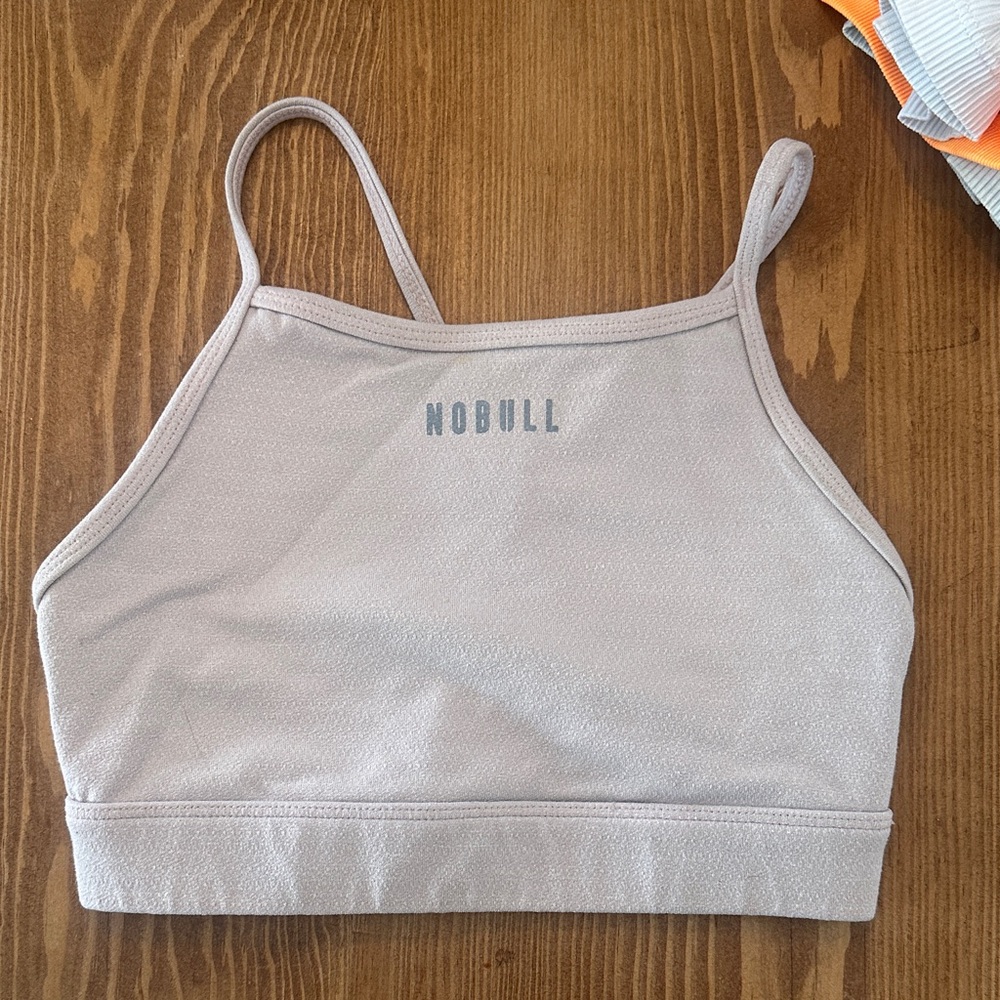 NOBULL Women's very light pink sports Bra